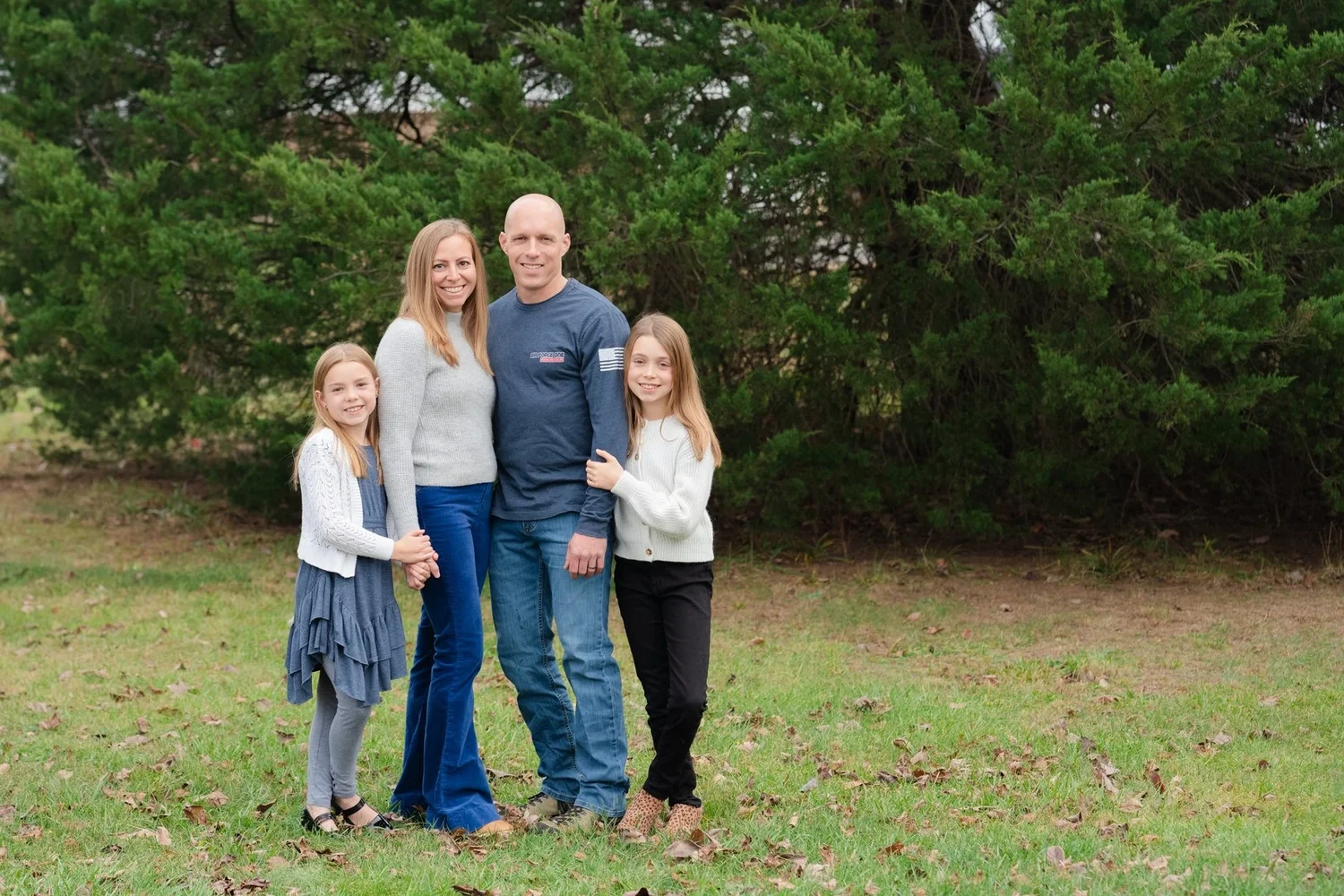 Jim with his family outdoors in Northern Virginia