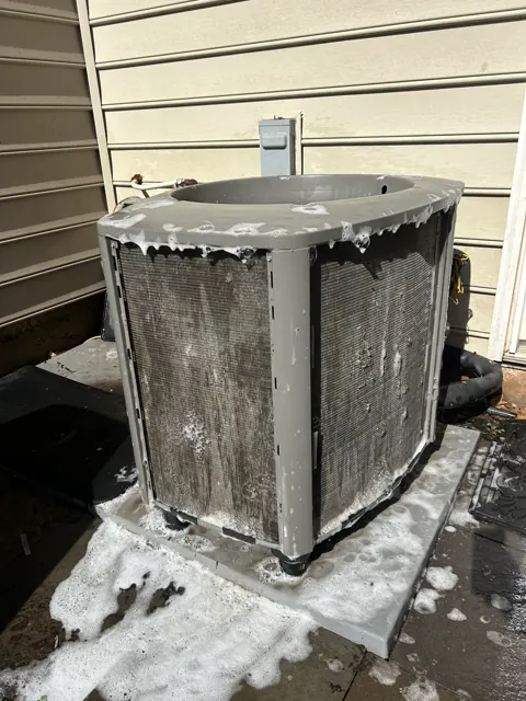 After: Exposed outdoor coil covered with foaming cleaner during maintenance